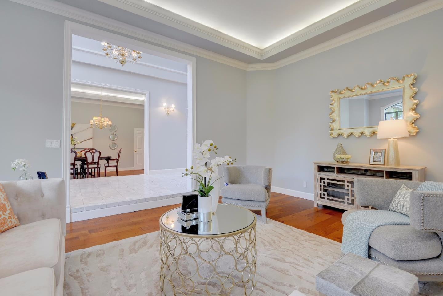 6802 Graystone Lane San Jose, CA 95120 - Photo 10 of 38 a living room with furniture and a chandelier