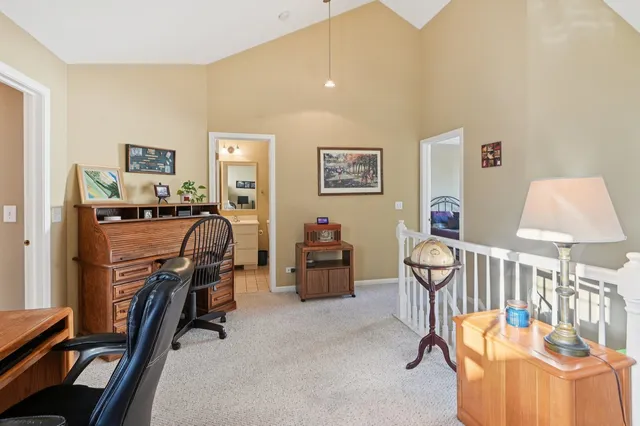 a bedroom with furniture and a window