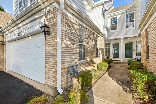 a view of a building with sitting area