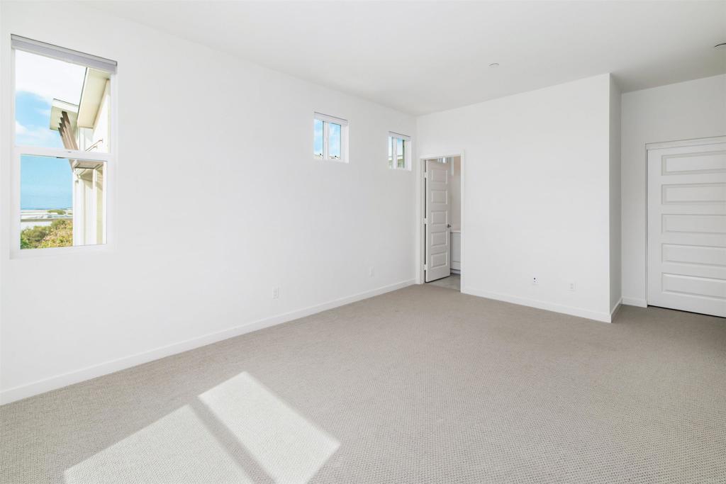 6140 Colt Place, Unit 104 Carlsbad, CA 92009 - Photo 20 of 37 a view of an empty room