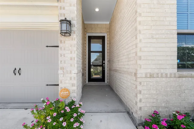 a front view of a house with an outdoor space