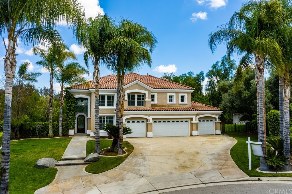 1629 Dustin Place Riverside, CA 92506 - Photo 1 of 1 a front view of a house with a yard