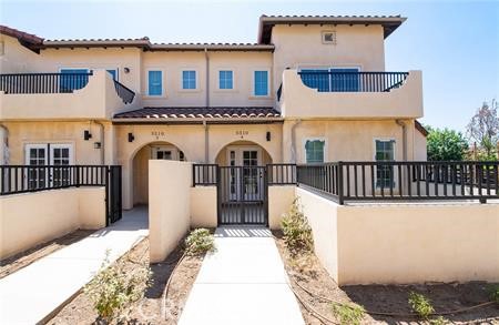 5502 East Los Angeles Avenue, Unit 3 Simi Valley, CA 93063 - Photo 1 of 48 a view of a house with wooden floor and a fence
