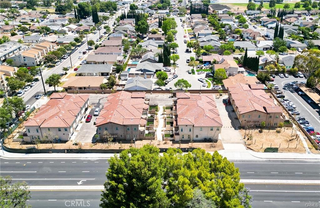 5502 East Los Angeles Avenue, Unit 3 Simi Valley, CA 93063 - Photo 31 of 48 an aerial view of residential houses with outdoor space