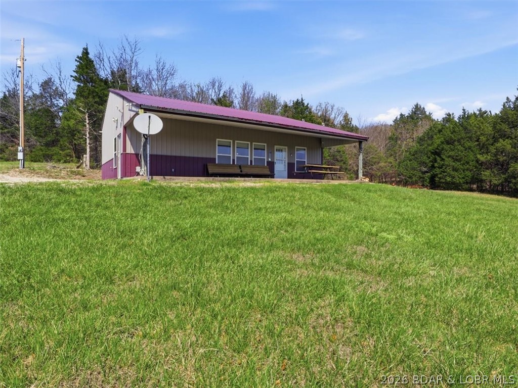 21756 Flippin Road Warsaw, MO 65355 - Photo 2 of 66 Patio that faces the pond