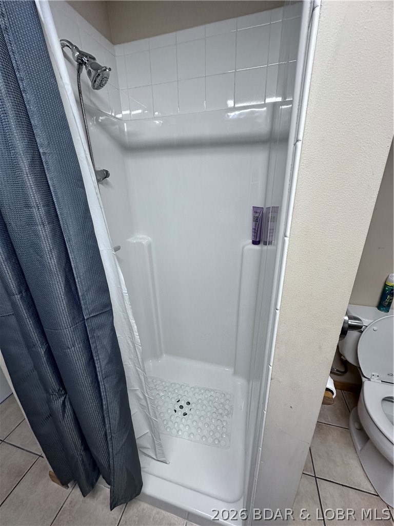 21756 Flippin Road Warsaw, MO 65355 - Photo 26 of 66 Both bathrooms have a walk-in shower