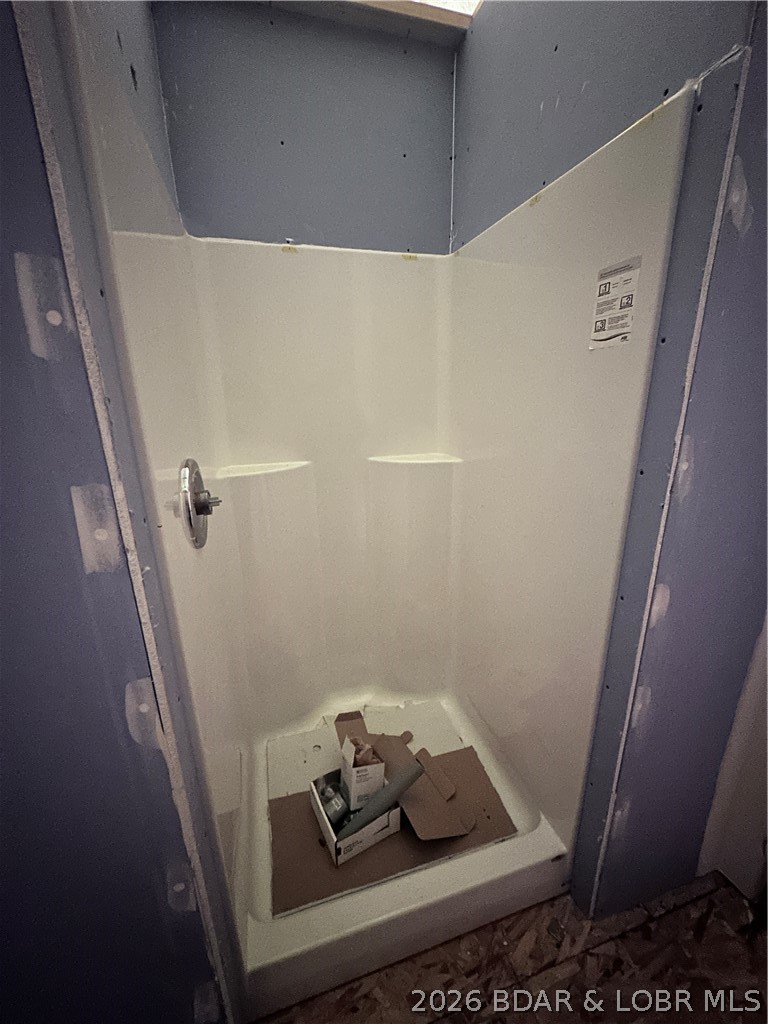 21756 Flippin Road Warsaw, MO 65355 - Photo 45 of 66 Installed shower in hangar living quarters