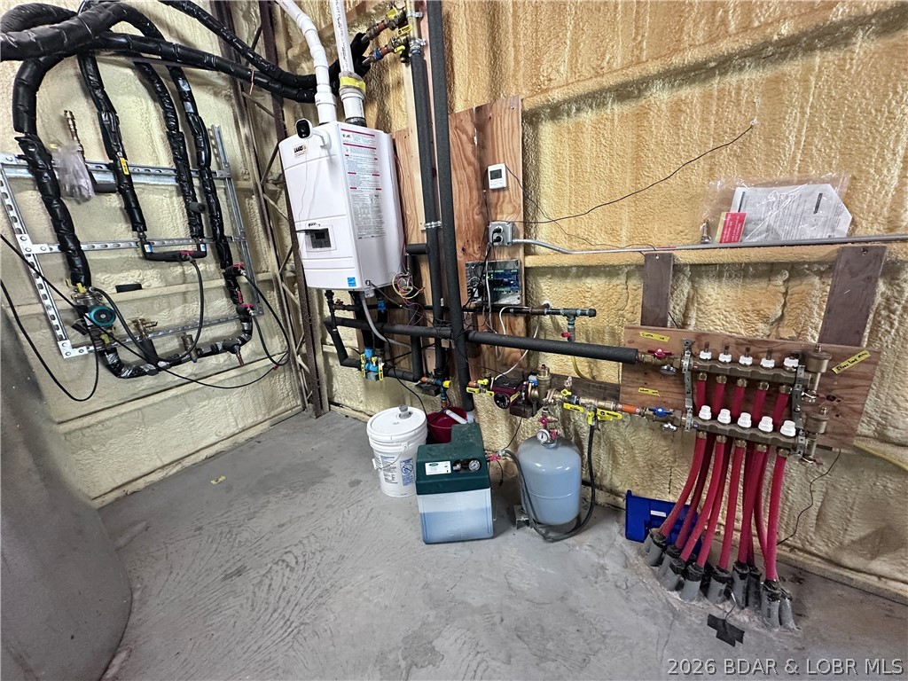 21756 Flippin Road Warsaw, MO 65355 - Photo 53 of 66 Water system for heated floors in hangar