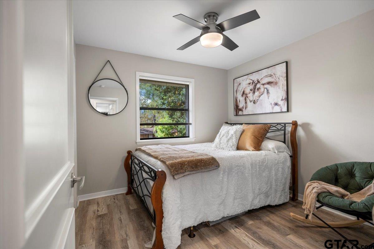 441 Hideaway Lane Hideaway, TX 75771 - Photo 13 of 38 a bedroom with a bed and a window
