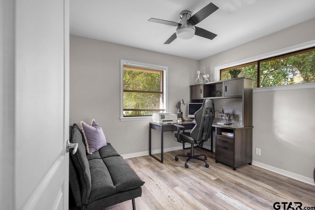 441 Hideaway Lane Hideaway, TX 75771 - Photo 19 of 38 a work room with furniture and a window