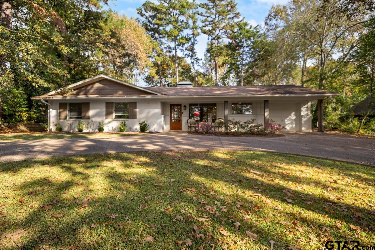441 Hideaway Lane Hideaway, TX 75771 - Photo 2 of 38 a front view of a house with swimming pool