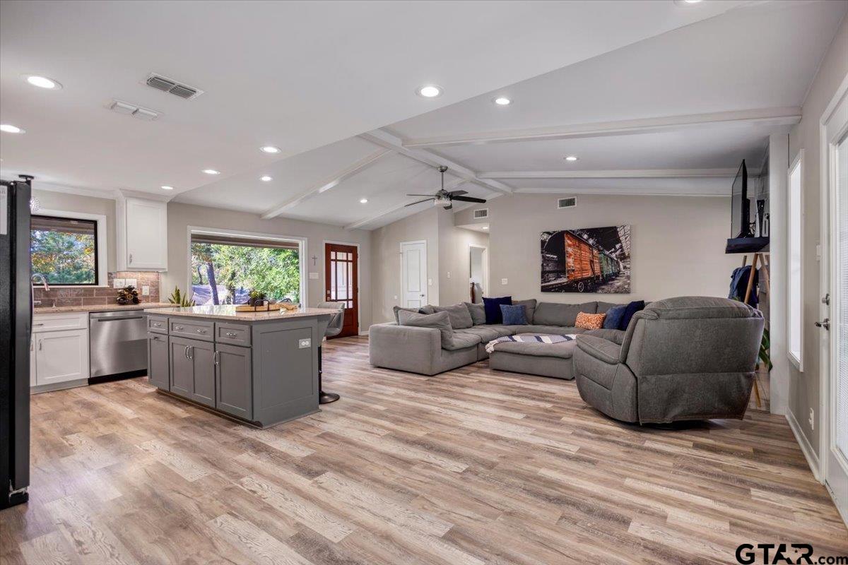 441 Hideaway Lane Hideaway, TX 75771 - Photo 8 of 38 a living room with furniture and a wooden floor