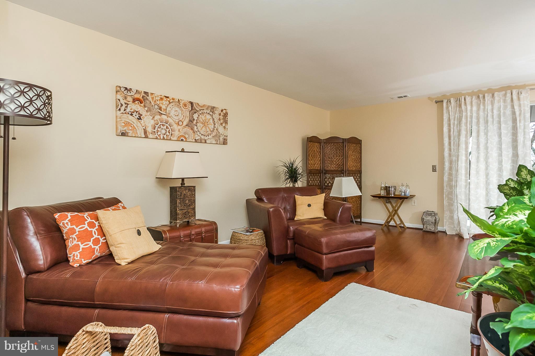 119 Cross Keys Road, Unit R119E Baltimore, MD 21210 - Photo 12 of 22 a living room with furniture