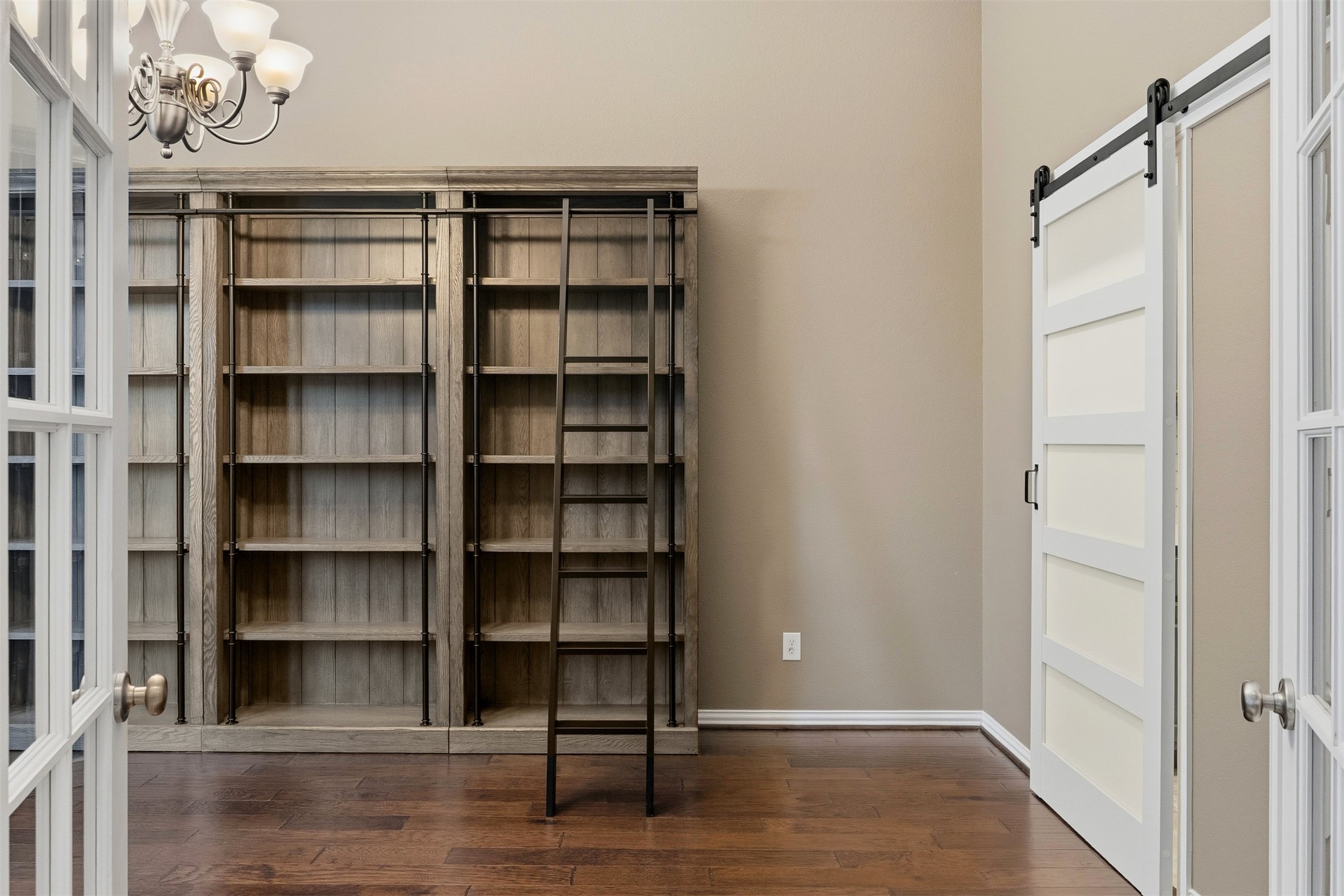 3935 Bowstring Bend Cedar Park, TX 78613 - Photo 5 of 39 Tucked behind french doors, this dedicated workspace provides a quiet environment for heads-down tasks or virtual meetings