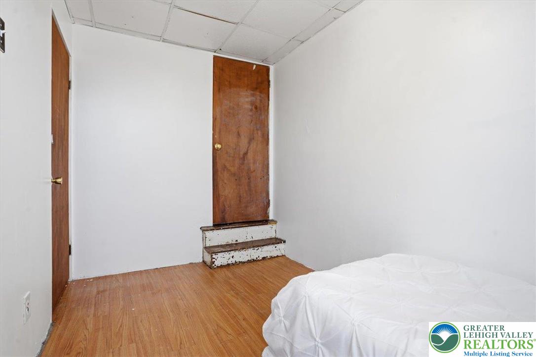 1171 Mechanic Street Bethlehem, PA 18015 - Photo 13 of 25 a bedroom with a bed and a window