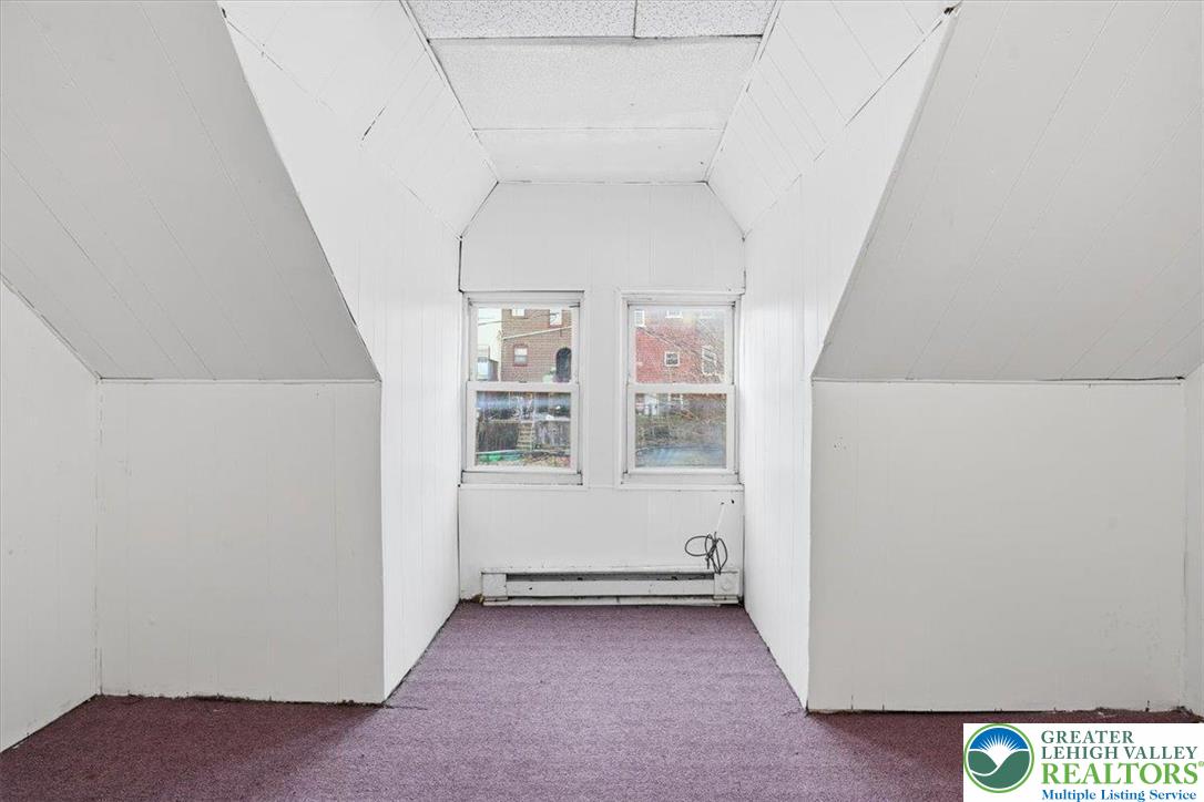 1171 Mechanic Street Bethlehem, PA 18015 - Photo 17 of 25 a view of an empty room with windows