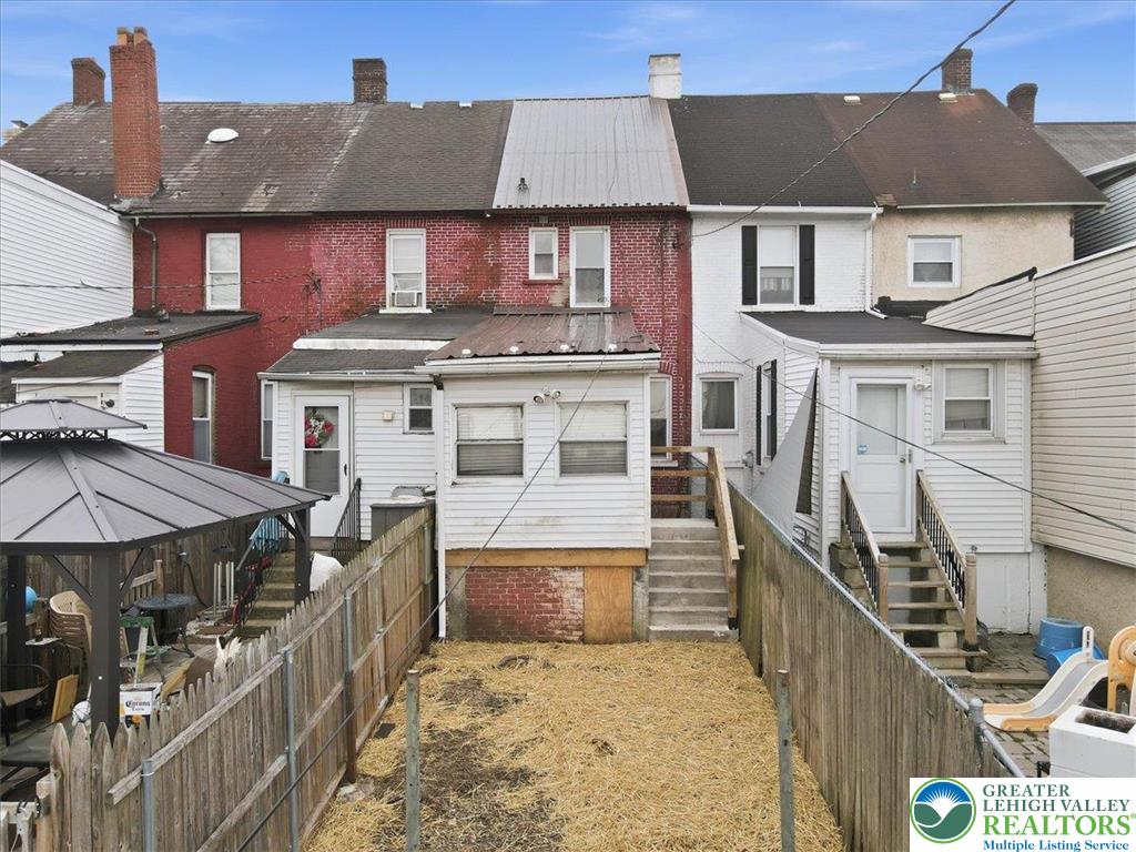 1171 Mechanic Street Bethlehem, PA 18015 - Photo 22 of 25 front view of a house with a small yard
