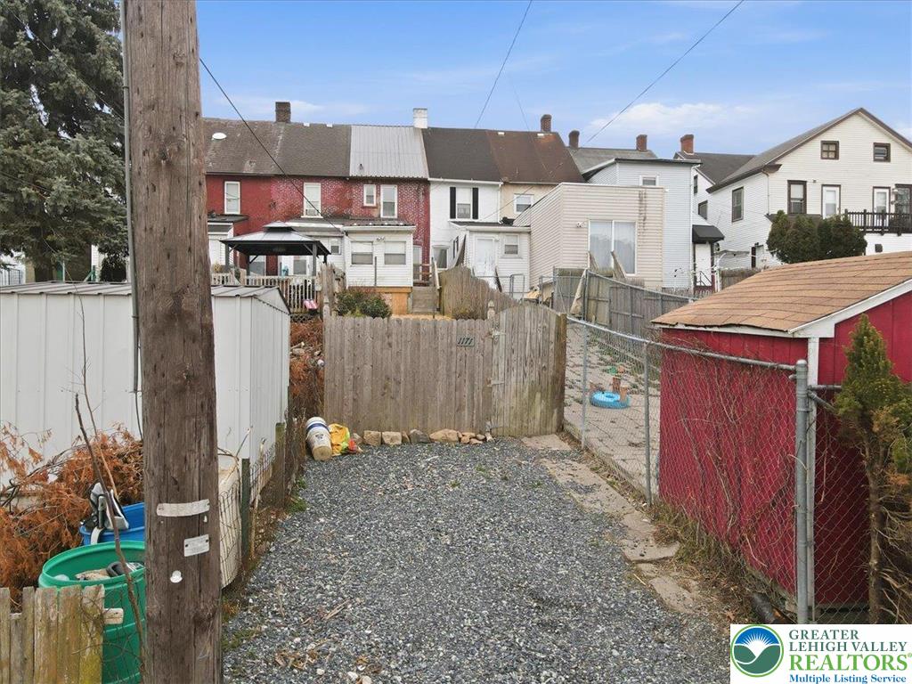 1171 Mechanic Street Bethlehem, PA 18015 - Photo 23 of 25 a view of a house with a wooden fence