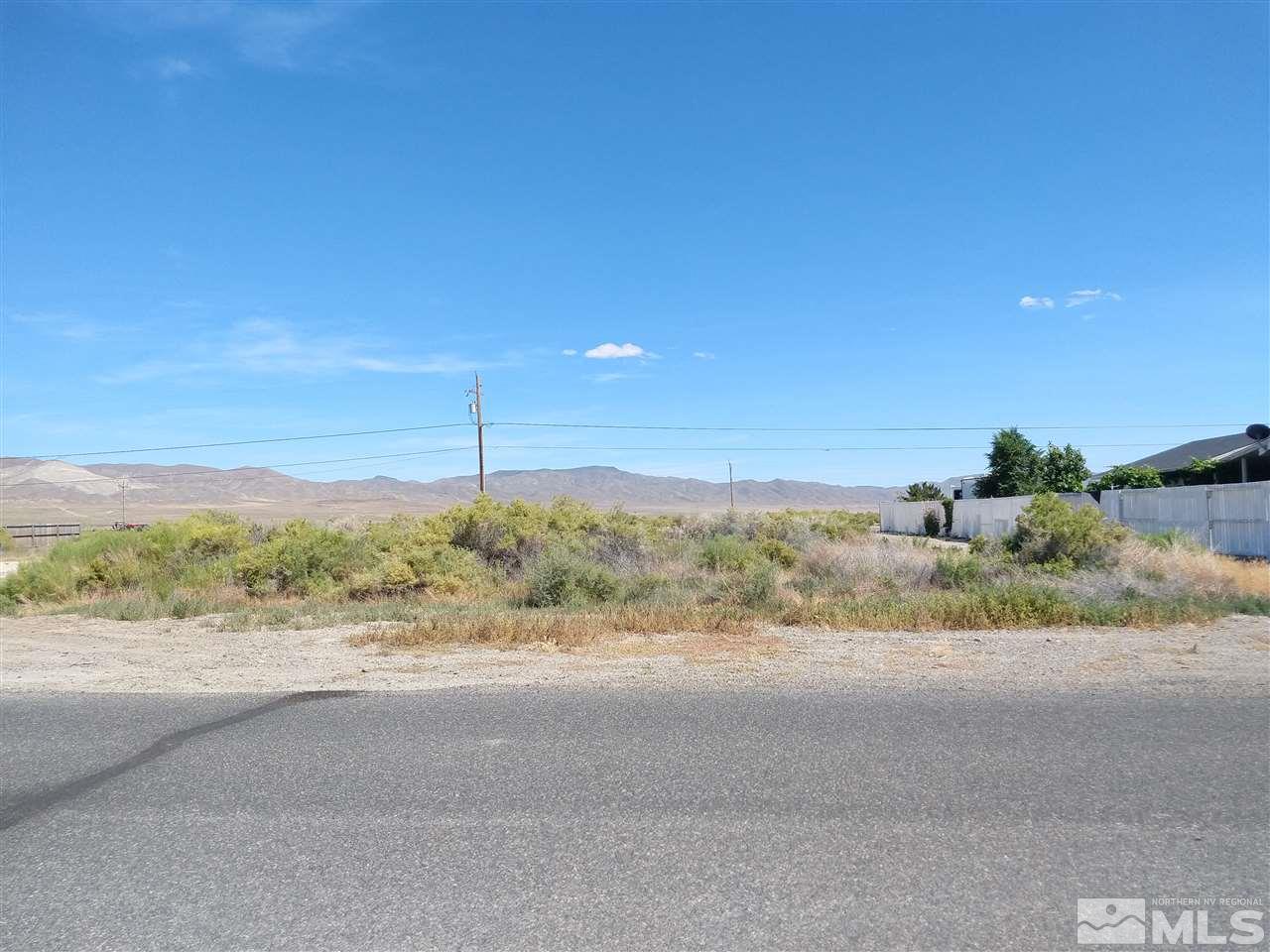 0 Reservoir Road, Unit 5 Lovelock, NV 89419 - Photo 3 of 4 a view of a road near a field