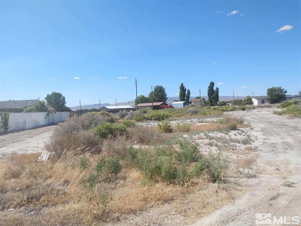 0 Reservoir Road, Unit 5 Lovelock, NV 89419 - Photo 4 of 4 a view of a dry yard with wooden fence