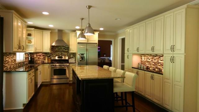 95 Walnut Tree Hill Road, Unit B Newtown, CT 06482 - Photo 1 of 1 a kitchen with stainless steel appliances kitchen island granite countertop a stove and a refrigerator