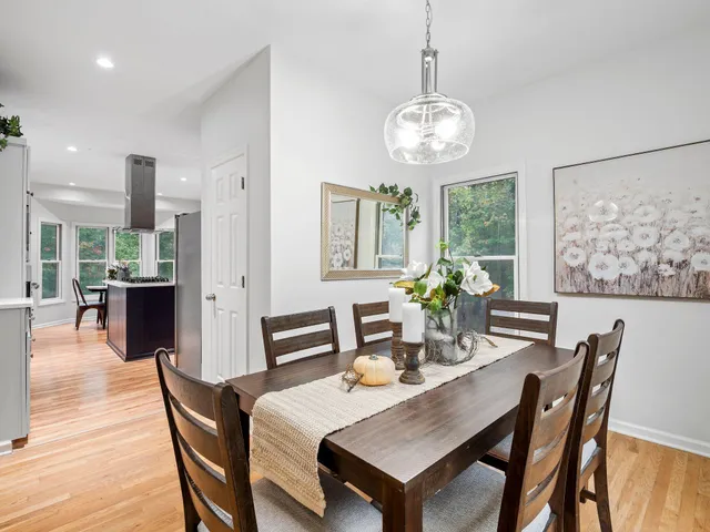 a bedroom with a large bed and a large window