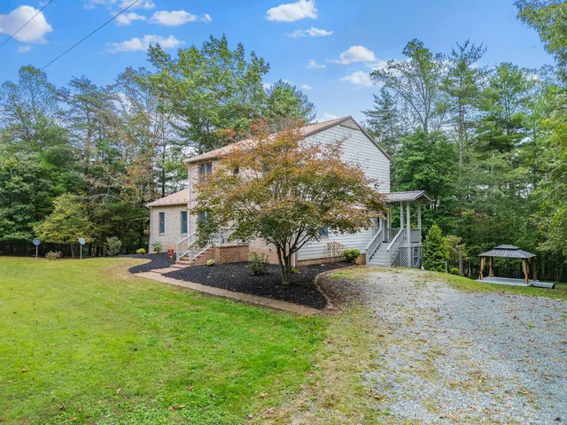 a view of a backyard with a garden