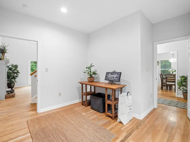 a bath tub sitting next to a window