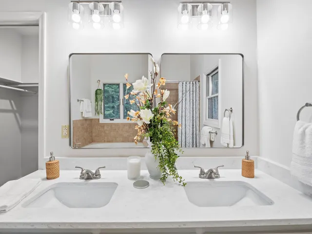 a workspace with furniture and a potted plant