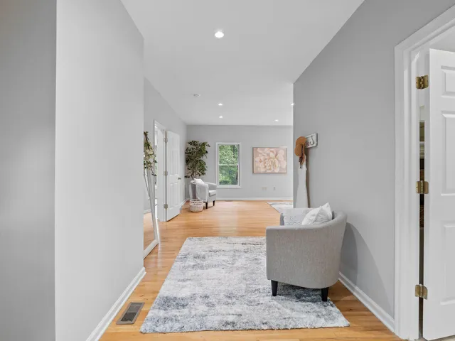 a workspace with furniture and a potted plant