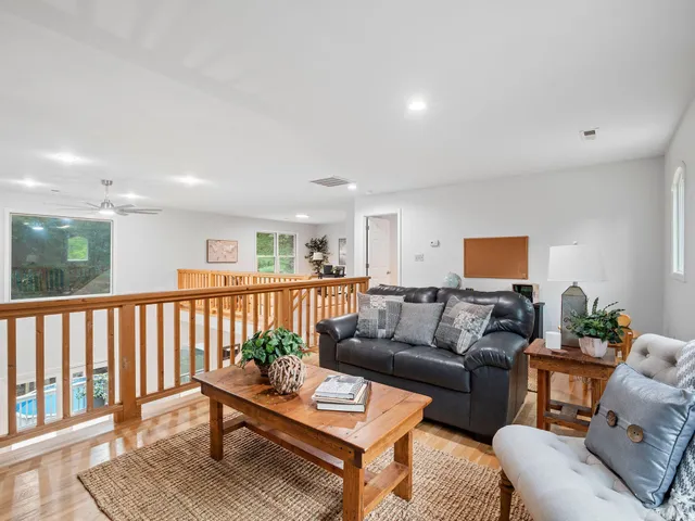 a kitchen with stainless steel appliances granite countertop a refrigerator and a stove
