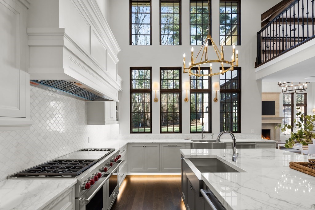 17 Bridle Pth Path Weston, MA 02493 - Photo 15 of 42 a kitchen with stainless steel appliances granite countertop a stove and a sink