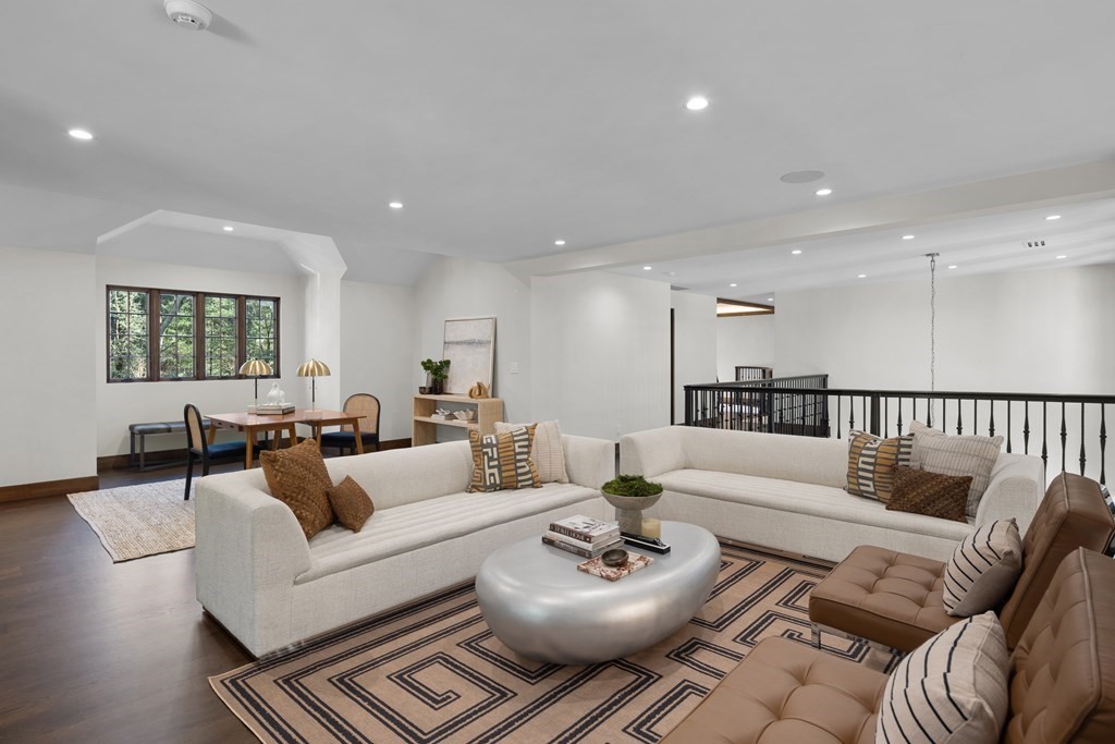 17 Bridle Pth Path Weston, MA 02493 - Photo 20 of 42 a living room with furniture and a wooden floor