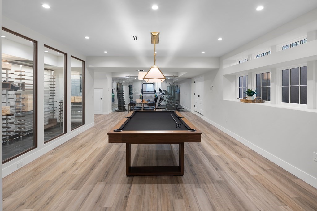 17 Bridle Pth Path Weston, MA 02493 - Photo 29 of 42 a view of a room with wooden floor windows and chandelier