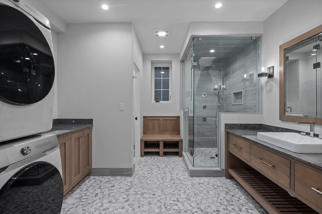 17 Bridle Pth Path Weston, MA 02493 - Photo 34 of 42 a spacious bathroom with a double vanity sink a mirror and a shower