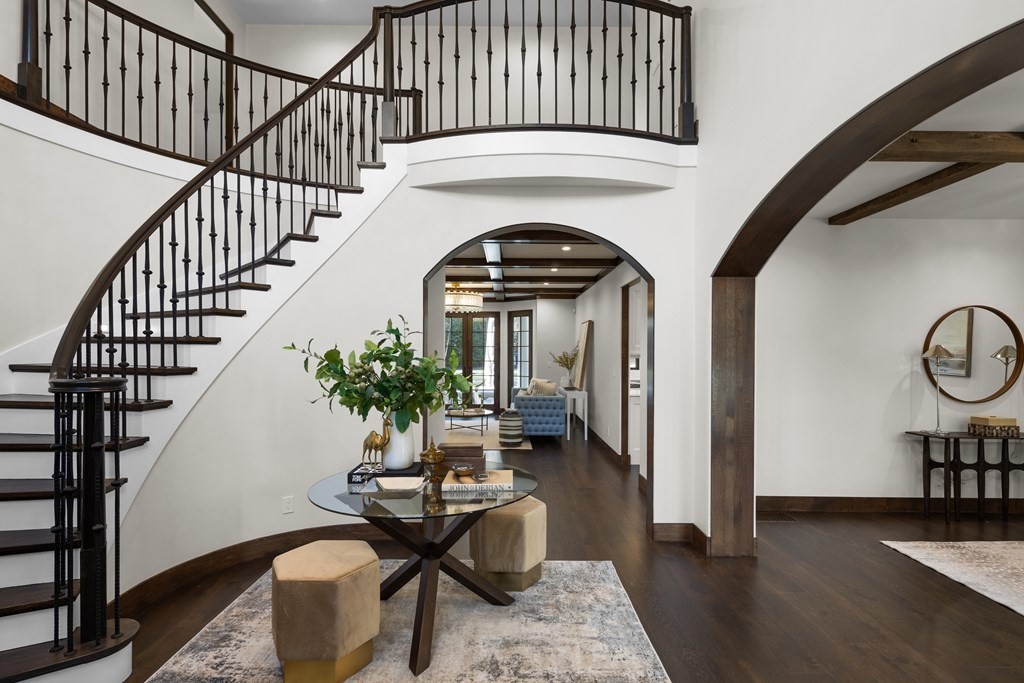 17 Bridle Pth Path Weston, MA 02493 - Photo 4 of 42 a living room with fireplace furniture or stairs and a wooden floor
