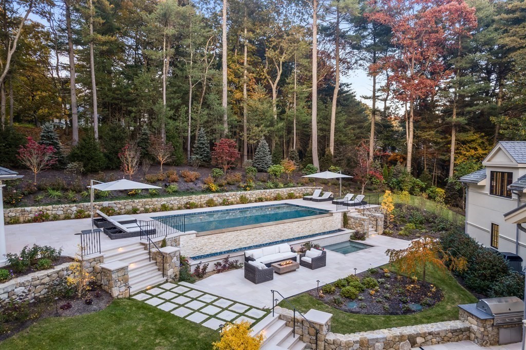 17 Bridle Pth Path Weston, MA 02493 - Photo 41 of 42 a view of a backyard with sitting area