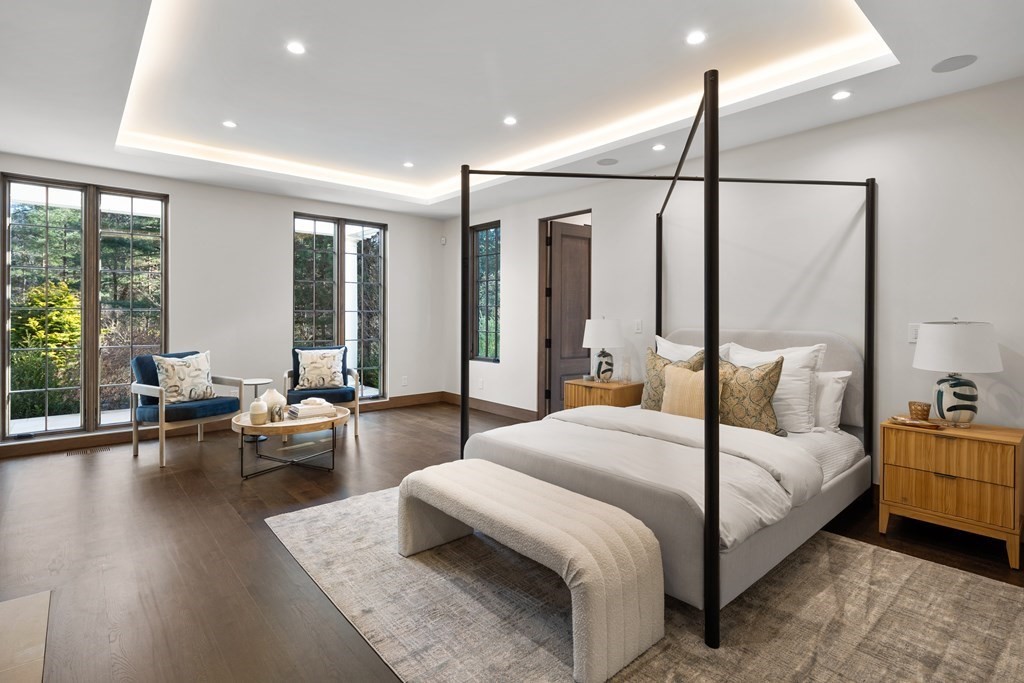 17 Bridle Pth Path Weston, MA 02493 - Photo 8 of 42 a bedroom with a bed couch and large windows