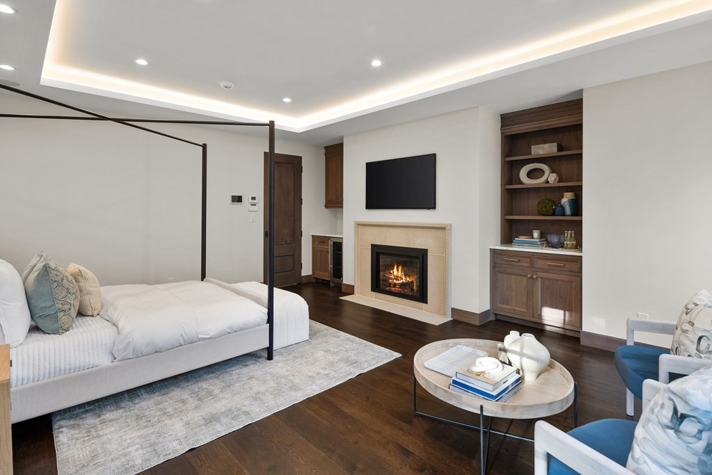 17 Bridle Pth Path Weston, MA 02493 - Photo 9 of 42 a living room with furniture and a fireplace