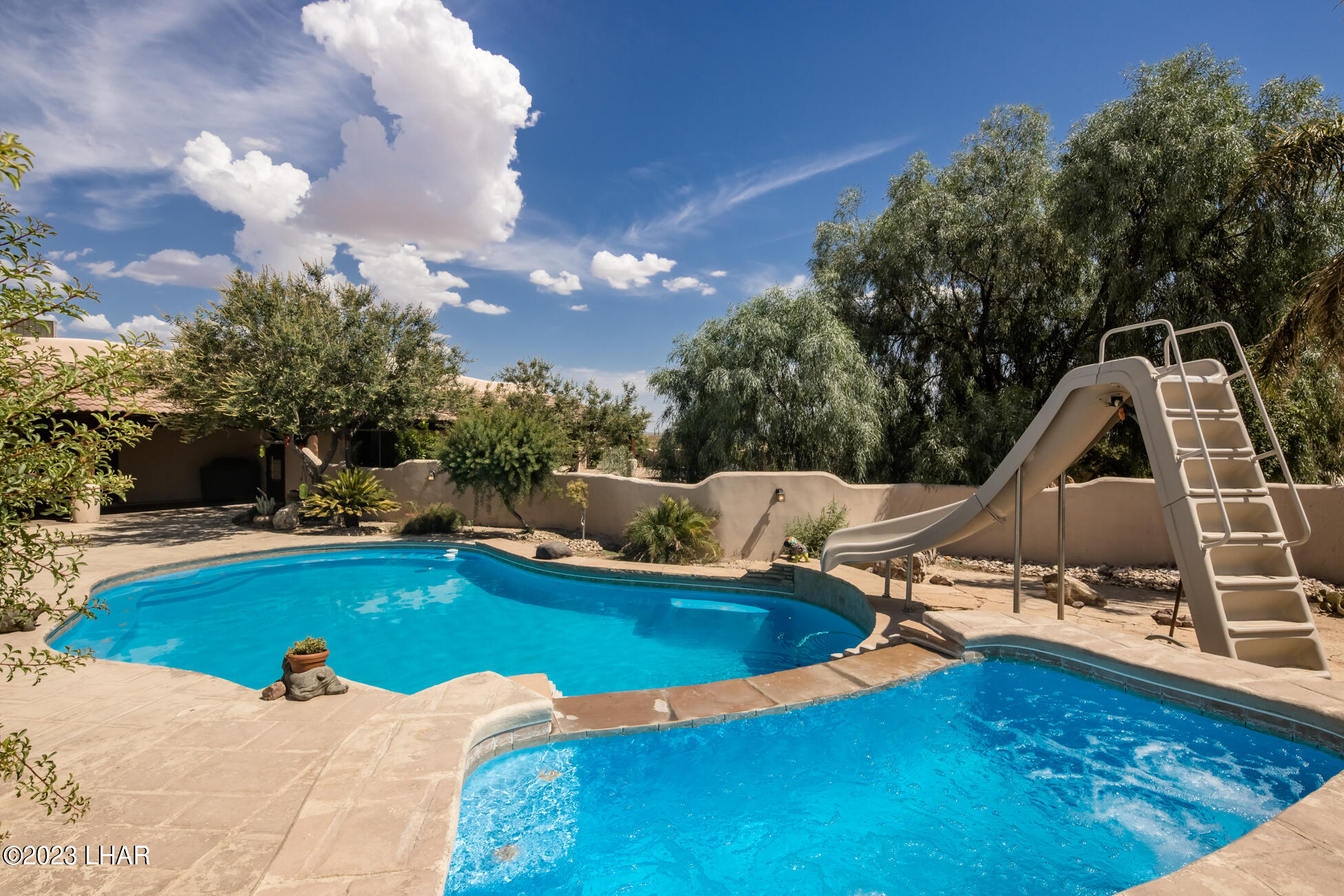 4203 West Wilshire Road Yucca, AZ 86438 - Photo 64 of 113 Refreshed Sparkling Pool and Spa