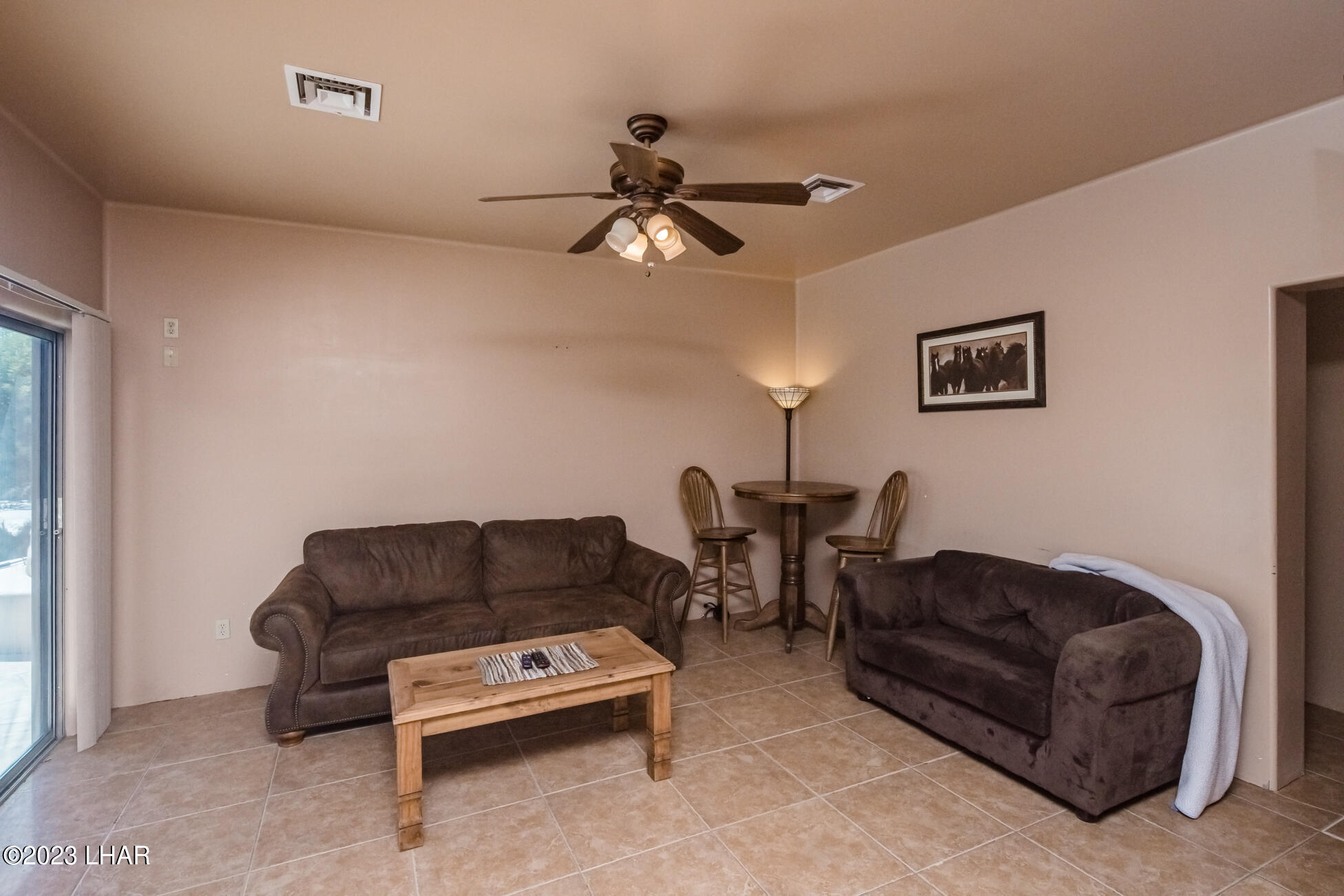 4203 West Wilshire Road Yucca, AZ 86438 - Photo 68 of 113 Casita Living Room