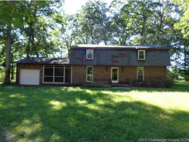 785 Iuka Road Iuka, IL 62849 - Photo 1 of 17 a front view of a house with a yard