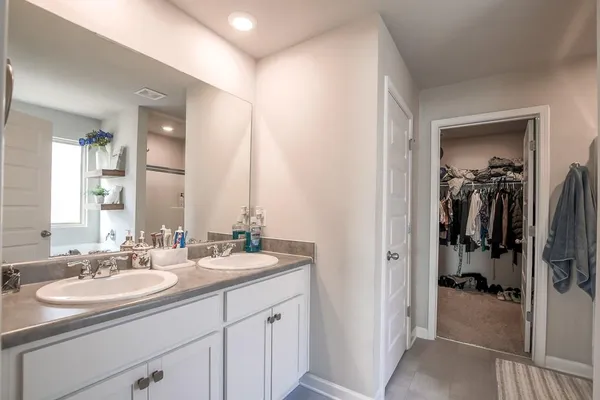 a bathroom with a sink double vanity
