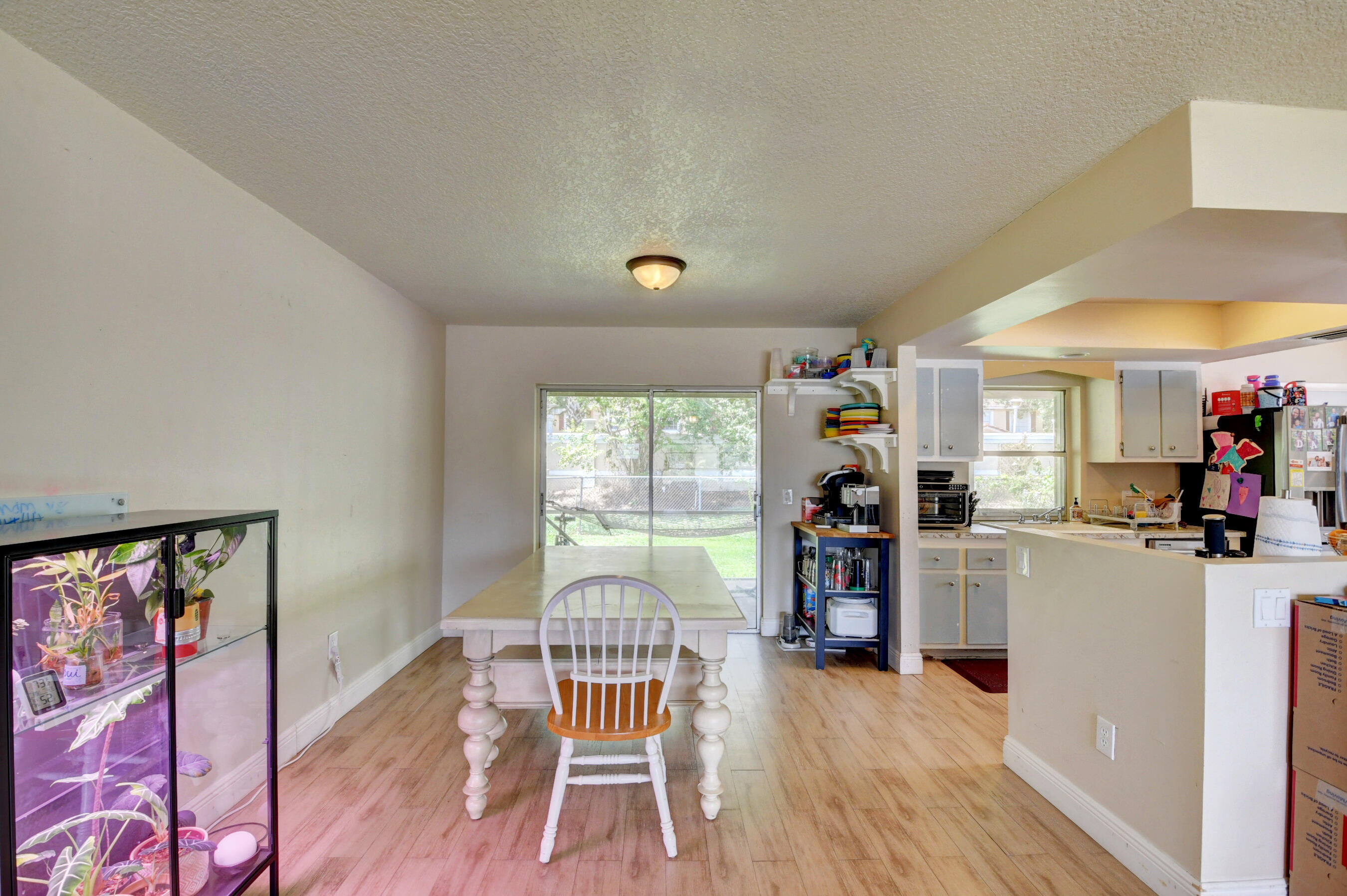 22093 Southwest 58th Avenue Boca Raton, FL 33428 - Photo 11 of 36 a living room with furniture and a wooden floor