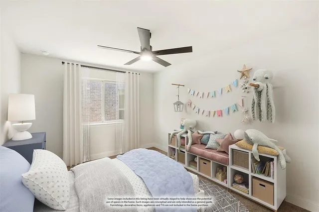 a bedroom with furniture and a window