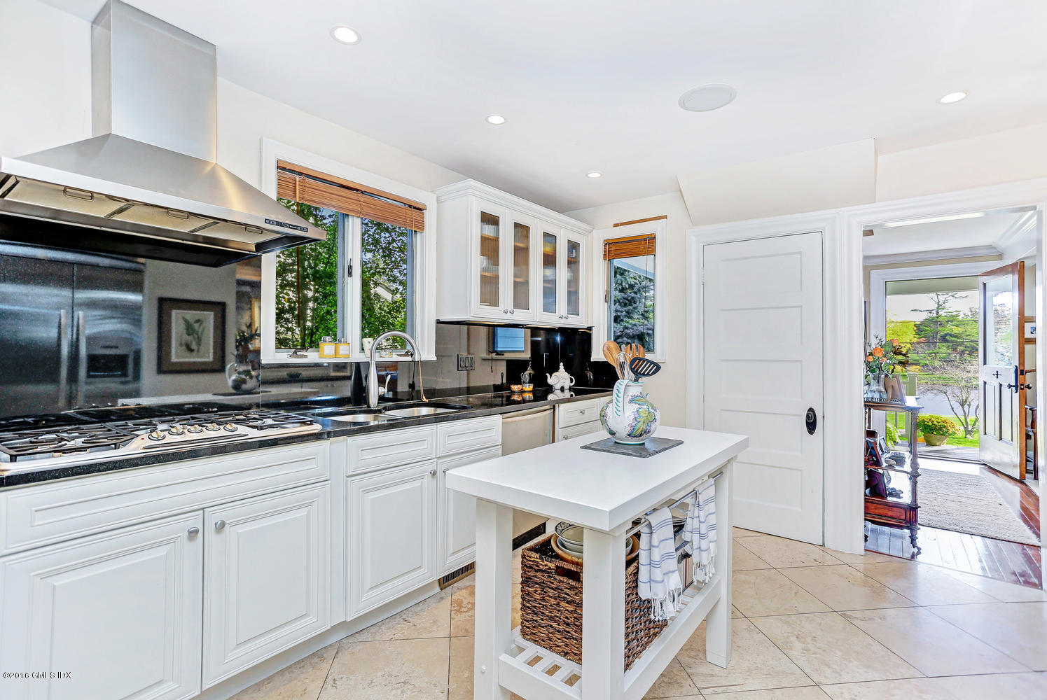 36 Arch Street Riverside, CT 06878 - Photo 14 of 37 a kitchen with a sink stove and cabinets