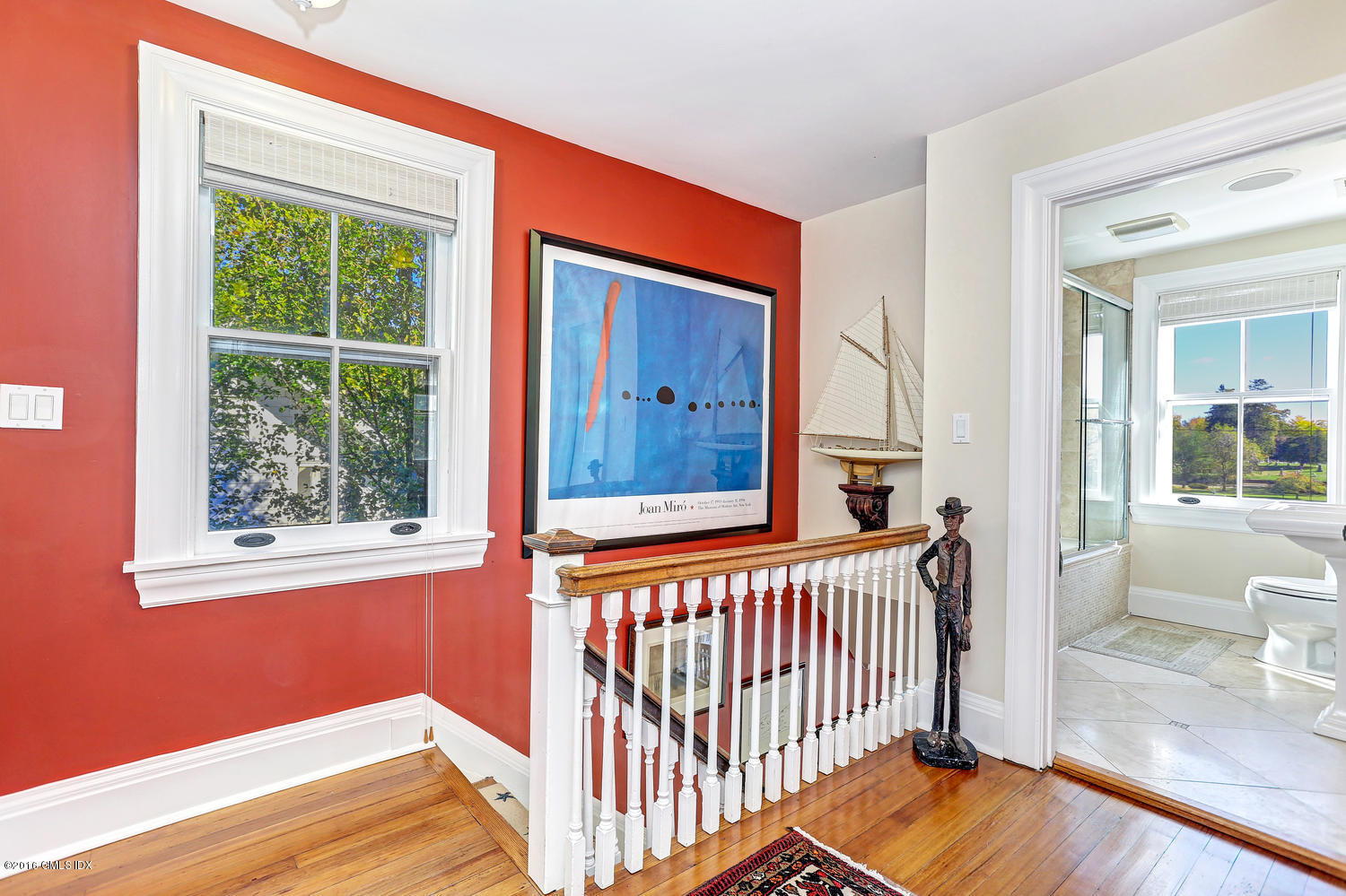 36 Arch Street Riverside, CT 06878 - Photo 17 of 37 a view of a room with wooden floor and windows