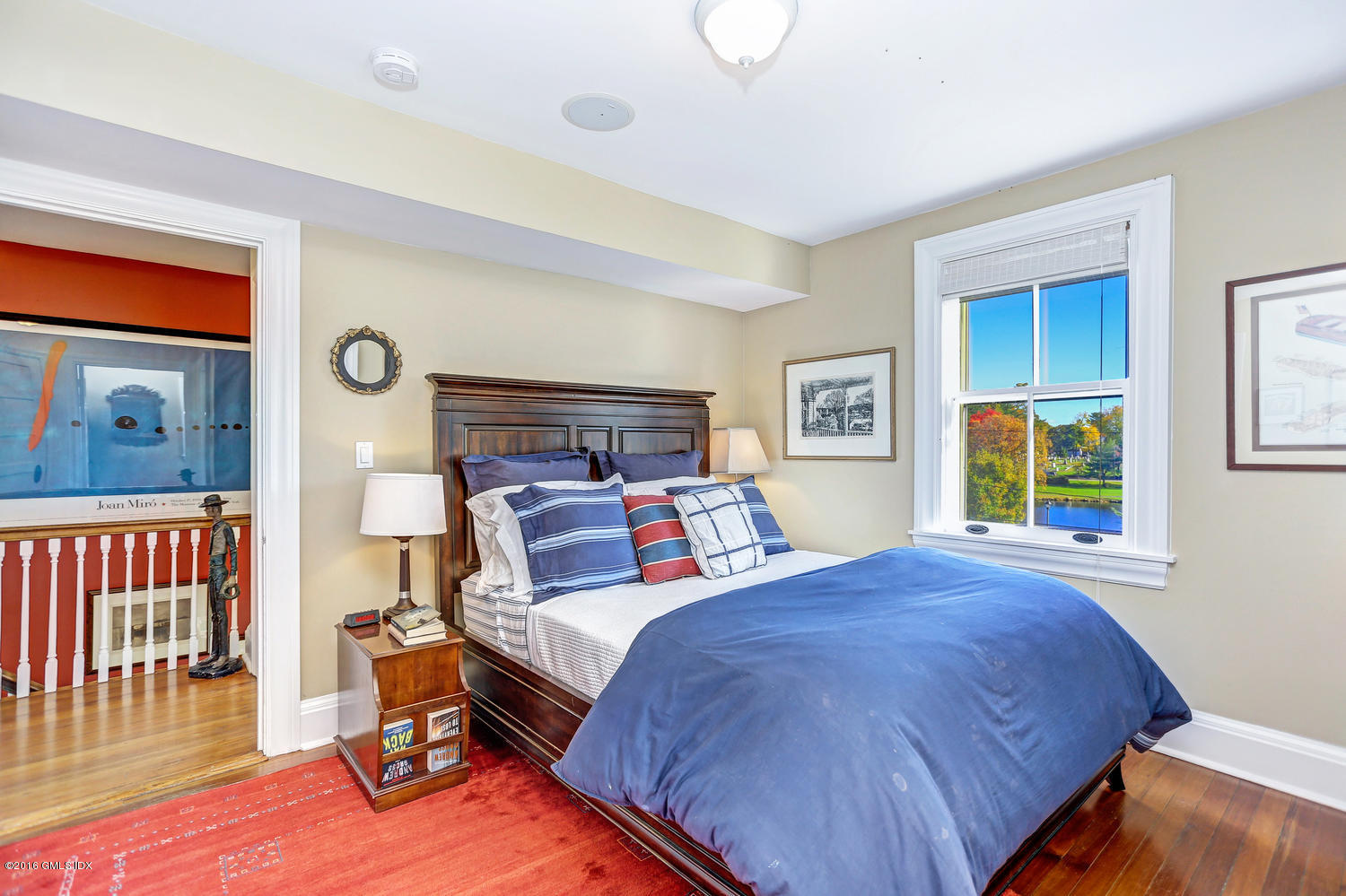 36 Arch Street Riverside, CT 06878 - Photo 18 of 37 a bedroom with a bed and a window