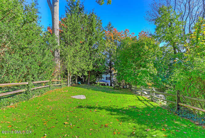 36 Arch Street Riverside, CT 06878 - Photo 25 of 37 a view of a field with a tree