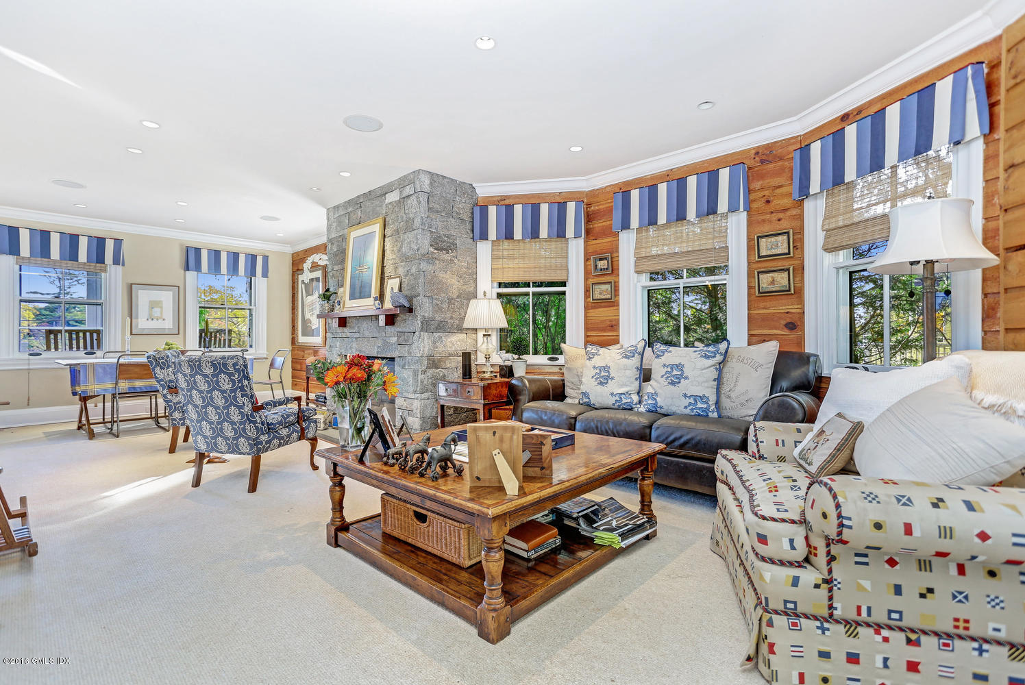 36 Arch Street Riverside, CT 06878 - Photo 6 of 37 a living room with furniture and a large window
